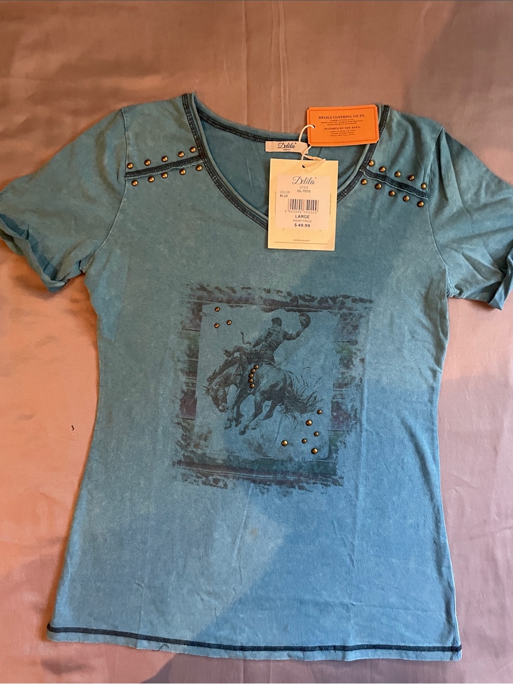 Delila Texas Co. boutique light blue shirt with embellishments. NWT!